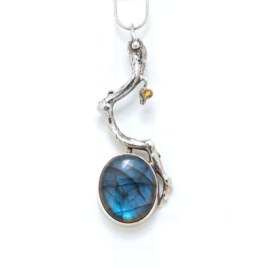 Sterling silver pendant with citrine and labradorite.