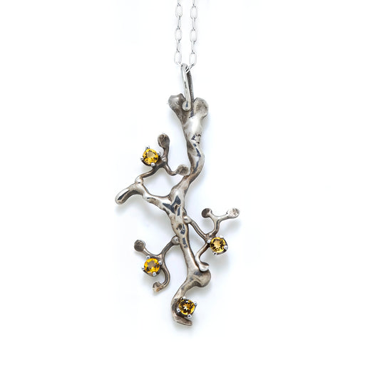 Sterling silver pendant with citrine.